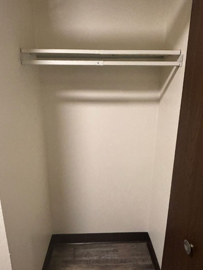 Closet with coat hanging rack